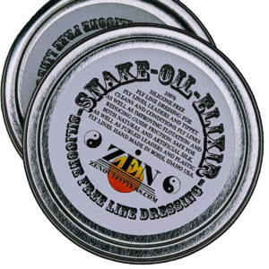 2 tins of Snake Oil floatant stacked.